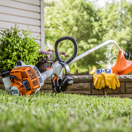 A Stihl weed whacker and gear.